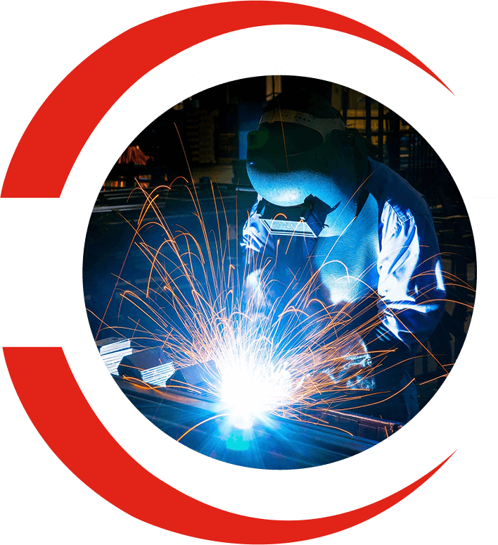 A welder working with sparks in a circular frame.